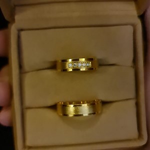 "A wedding ring is a symbol of love, loyalty, and commitment in a...