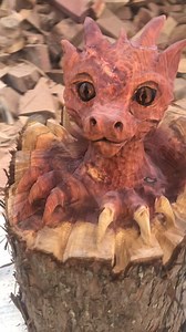 How cute is this baby dragon!? . Hands up who wants one. Please form an orderly queue. . #cute #dragon #dragonlover #fantasy #woodcarving #woodworking #chainsawcarving | Titan Elysian