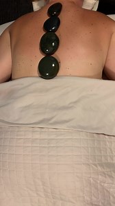 Lose yourself in love with a relaxing stone massage featuring CBD...