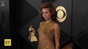 GRAMMYs: Miley Cyrus Rocks See-Through Gold Gown