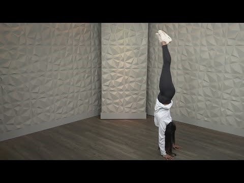 University of Illinois Woman's Gymnastics Team Handstand and Landing