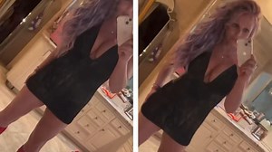Britney Spears shows off new PURPLE hair while modeling plunging mini dress