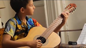 My 9-year-old son, Daniel, is actively passionate about playing the guitar. His love for music and the instrument is helping him maintain a positive outlook during these challenging times in Israel, where sirens constantly sound due to the ongoing war. He's not wasting time and is diligently learning to play the guitar, which brings him joy and hope for a brighter future. | Alex Levin, Art Levin Studio. www.ArtLevin.com