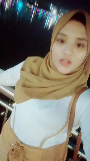 Evening Balcony Views: Casual Moments by the Waterfront