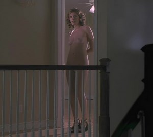Amanda Peet nude in The Whole Nine Yards