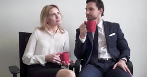 Man and woman flirting while coffee break