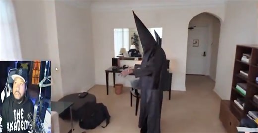 WATCH: Kanye West Stuns Interviewer as He Shows Up in KKK-Inspired Outfit