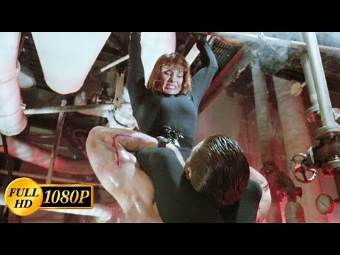 Jean-Claude Van Damme in a struggle between Corey Everson's legs / Double Impact (1991)