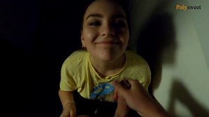 The girl gives a blowjob on a public balcony, and then walks with a cum on her face