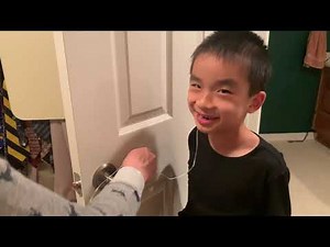 Pulling Loose Tooth with a String Tied to the Door