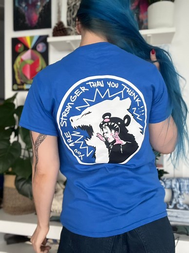 9.4K views · 227 reactions | Courage tshirts are available now! https://lorazombie.com/products/5yearcourage-unisex-tee-by-lora-zombie?_pos=1&_sid=46e65ba93&_ss=r | Lora Zombie | Facebook