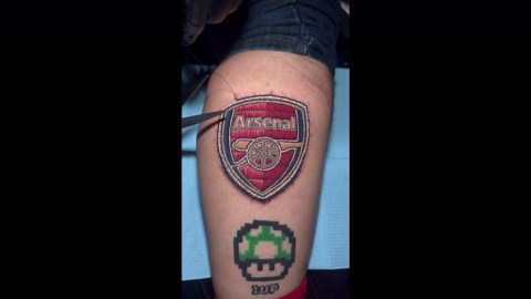 Man embroiders Arsenal logo onto arm (33M views on Instagram)