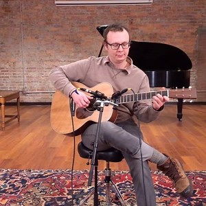 Robinson Earle plays the Bourgeois Guitars Aged Tone acoustic no....