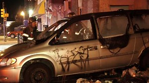 Minivan catches fire on Philadelphia sidewalk