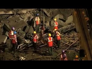 At least 11 killed, others trapped in India building collapse