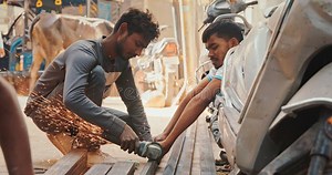 Varanasi, India. Man Cuts a Metal Blank with Grinder. Slow Mo Video Cut Metal. Bright Sparks Fly when Cutting Metal. Men Editorial Image - Image of slow, factory: 406130865