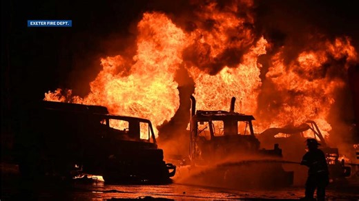 Firefighters battle multi-alarm fire involving multiple oil tankers in Epping, officials say