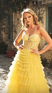 1.3K views · 3 comments | ✨ This glamorous strapless yellow corset gown features a breathtaking lace top and a voluminous ruffled skirt, creating an unforgettable elegant silhouette.⁠ ⁠  AP 61553 ⁠  https://alyceparis.com/products/formal-dress-61553?_pos=1&_sid=b23550ec3&_ss=r⁠ ⁠ #alyceparis #corsetdress #ruffledress | Alyce Paris | Facebook