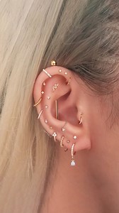 Explore Uniquely Curated Ear Piercing Combinations for Females, adorned with Luxurious Gold Jewelry from Impuria.✨ . . . . . #earpiercings #earrings #piercings #earringsofinstagram #earringstyle #curatedear #earringshop #earringaddict #earringswag #earringstagram #cartilagepiercing #traguspiercing #helixpiercing #jewelry #piercinggirl #daithpiercing #conchpiercing #rookpiercing #earcuration #cartilagepiercings #earstack #earstyle #earstylist #newpiercing #earpiercing #flatpiercing #snugpiercing 