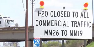 Several 18-wheeler drivers ticketed after getting stuck behind overturned trailer on I-20