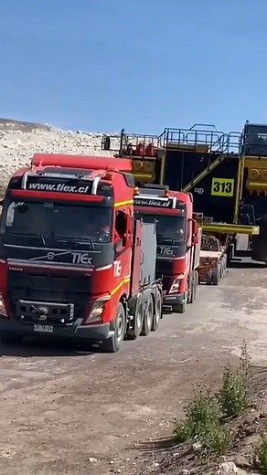 Two Volvo 540 trailers transporting Caterpillar 797F trucks | Giant Machine