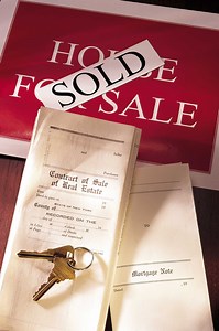 Pros & Cons of Selling a Home on a Land Contract
