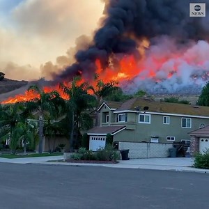 The Blue Ridge Fire burned directly behind homes in Chino Hills, California, as dark smoke rose from the flames. The fire has has scorched more than 15,000 acres and has destroyed at least one house, according to fire officials. https://abcn.ws/37Pkt5d | ABC News
