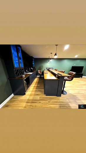 Another stunning basement transformation! 🎬🍸💪 This remodel features a cozy home theater, stylish bar area, and modern exercise room — all tied together with bold, strong colors that bring energy and personality to the space. A perfect mix of comfort, function, and style! | Homeserve Construction Inc.