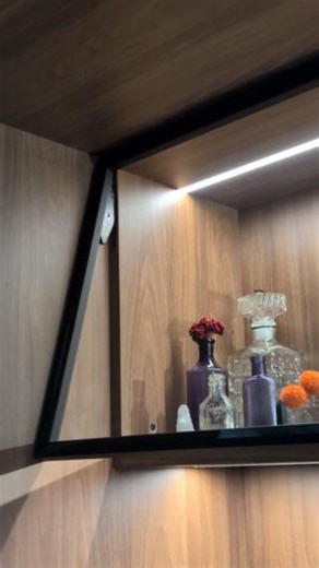 Don’t be haunted by bulky hardware in your display cabinets! With AVENTOS HKi, everything is hidden neatly in the side panel—no tricks, just sleek, seamless design. Transform your cabinet into a spook-tacular display that highlights your treasures, not the hardware. | Blum USA