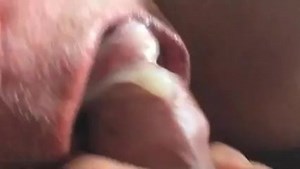 Man wanking in stockings with bell end strap spunk closeup