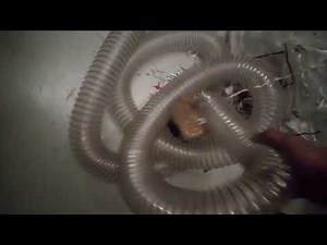 Powerful industrial Vacuum Slurps up shredded paper and a plastic bag