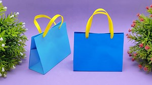 5.9K views · 18 reactions | Learn how to fold origami hanging bag - Paper craft ideas - Homemade paper bag making tutorial #OrigamiIdeas #PaperBag #Crafts | Entertaining Arts | Facebook