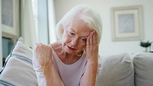 Senior Woman Sitting On Sofa Home Stock Footage Video (100% Royalty-free) 1009355477 | Shutterstock