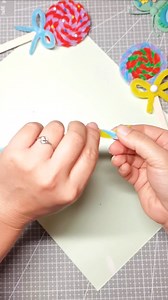 Title: Create a Fun Lollipop with Twisting Sticks: A Sweet and Simple Craft! Hashtags: #TwistingStickCraft #LollipopCraft #Handmade #DIYProjects #CreativeKids #KidsCrafts #CraftingFun #EasyCrafts #ArtActivities #ColorfulCrafts | paper craft