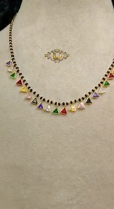 2.9K views · 89 reactions | Repost ...... beautiful  black beads with multicolour stone drops ......14 carat Hallmark gold jewellery For booking & price details Watsapp on this given number: 9073766134 | Lavya jewels | Facebook