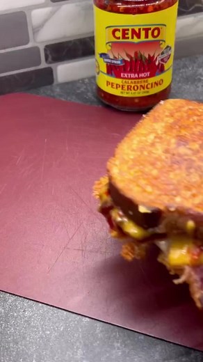 2.1K views · 74 reactions | You're hot  Would you smash this spicy bacon grilled cheese sandwich? 肋索| Credit: @cory_in_the_kitchen Ingredients: -Buttered Bread in a hot skillet -Handful of Shredded Sharp Cheddar Cheese -Layers of Crispy Bacon -Handful of Shredded Mexican Blend Cheese -Extra Hot Calabrese Peperoncino’s -Buttered Bread | Lickyourphone | Facebook