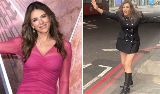 Liz Hurley dances in the ocean