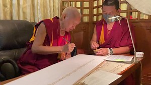 Rinpoche writing the Prajnaparamita sutra in gold with Ven.Tsering (who has been himself writing out the sutra for over 15 years). On the incredible benefits of writing this sutra Rinpoche has said: “By writing the Prajnaparamita we create more merit than making offerings to the three great thousand world systems (trichilicosm) completely filled with Mount Merus of stupas made of the seven types of jewels. We receive patience in the profound Dharma, emptiness, and we have no fear of meditating o