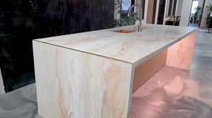 Our team of experts carefully construct custom renovations like this island featuring sleek waterfall edges. Allow us to assist you in rejuvenating your spaces. 970.628.1846. #DiamondCoatEpoxy | Diamond Coat