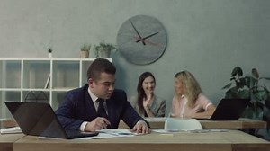Stressed male office worker has nervous breakdown