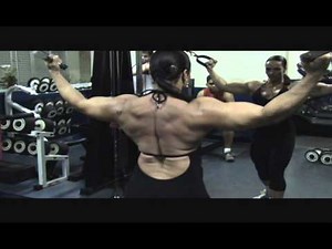 Strong muscle woman Hero Curls biceps workout