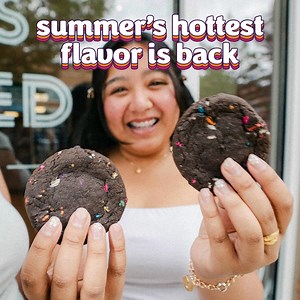 Bite into fudgy, chocolate cookie baked with rainbow sprinkles, filled with rich buttercream and topped with MORE rainbow sprinkles. It's honestly just so good. | Insomnia Cookies