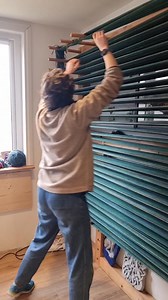 The next stage in weaving is chaining off, we had a near calamity when the warping frame gave a loud bang and a cracking appeared where it was flush with the wall. Instead of risking the nearly complete warp, Martha chained it off, then did the last 150 or so threads by themselves! You can see the odd beaming on of a two section warp in our next video! | The Weaving Shed