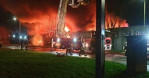 Two arrested after devastating blaze destroys businesses