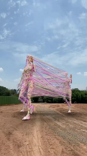 Colorful String Dance Performance in Outdoor Setting