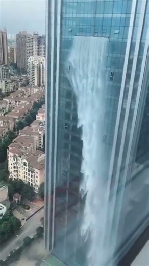 🏞️💦 Have you ever seen a waterfall inside a building? 📍Guizhou Waterfall Building #GuizhouWaterfallBuilding #SpectacularArchitecture #ChinaTravel #UniqueExperiences | China Highlights