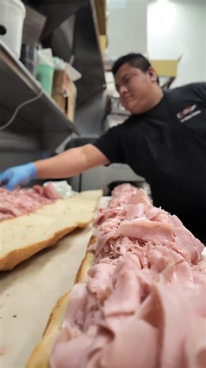 Party-sized. Crowd-approved. The 3-foot sub is officially a Pizza One flex. | Pizza One