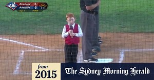 Boy sings national anthem at baseball game despite hiccups