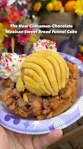 Foodatdisneyland on Instagram: "Cinnamon-Chocolate Mexican Sweet Bread Funnel Cake from Stagedoor Café in Disneyland $9.99 Magic Key Discounts Available Classic Funnel Cake drizzled with Cinnamon-Chocolate Sauce, Whipped Topping and Mexican Sweet Bread. This new funnel cake arrived in celebration of Hispanic Heritage Month and let me tell you - it is delicious! Also, the design on it is top notch! Every morsel was sensational. #disneyland #foodatdisneyland #disneyeats #hispanicheritagemonth"
