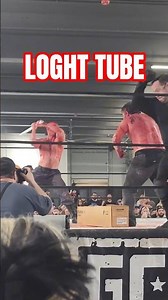 SLADE HITS BEAR BRONSON WITH A LIGHT TUBE